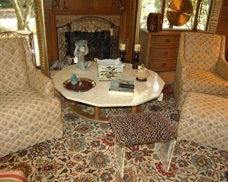 Upholstered club chairs and matching ottoman