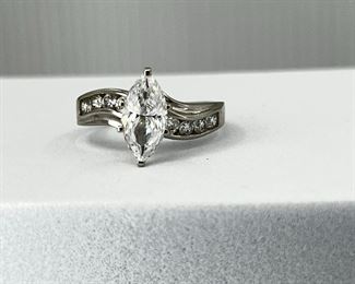 14K white gold Engagement ring with One CZ Eyeshape Diamond. 4.40 gr. $200.-