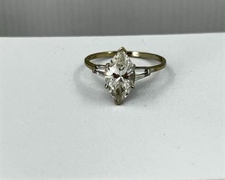 14K white gold Engagement Ring with One CZ Eyeshape Diamond. 3.60 gr. $165.-