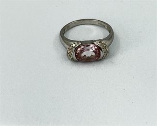 14K white gold ring with pink sapphire stone and diamonds. 3.4 gr. $155.-