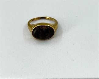 10K yellow gold ring with brownstone. 2.5 gr. $90.-