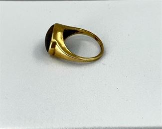 10K yellow gold ring with brownstone. 2.5 gr. $90.-