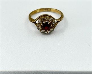 10K yellow gold ring with Circle Shape Ruby Rig & Diamonds. 3.60 gr. $130.-