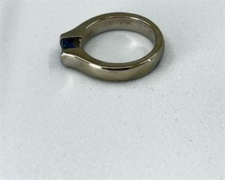 14K white gold Ring with One Small Blue Topaz stone. 8.20 gr.- $370.-