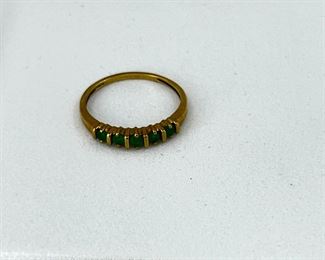 14K yellow gold ring with emerald stones. 2.5 gr. $115.-