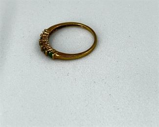 14K yellow gold ring with emerald stones. 2.5 gr. $115.-