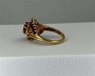 10K yellow gold Ring with Light Rubies. 4.50 gr. $160.-