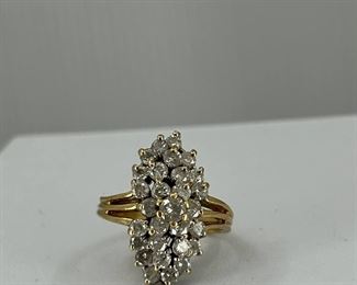 14K yellow gold Ring with multiple Diamonds like a Trapazoid. 7.20 gr. $630.-