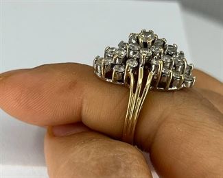 14K yellow gold Ring with multiple Diamonds like a Trapazoid. 7.20 gr. $630.-