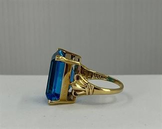 10K yellow gold ring with One very Big Blue Topaz Stone. 8.50 gr. $300.-