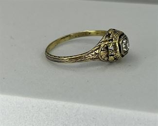 14K yellow gold Ring with one Diamond. 2.40 gr. $110.-