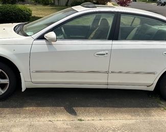 Nissan Altima (white): PRICE TAG $3,000
Year: 2005
Mileage: 120000-ish
Features: 6 cd changer, moon/sun roof
Issues: needs a new battery. 
Summary: Good otherwise