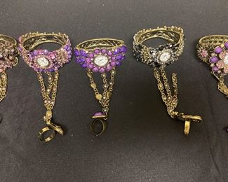 Five Watches with Rings