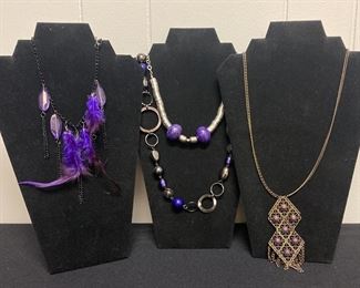 Four Purple Necklaces