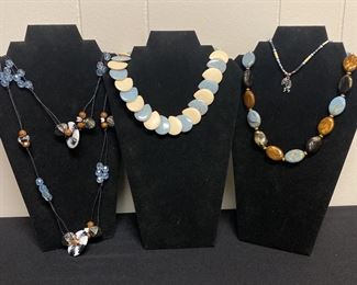 Four Splash of Light Blue Necklaces