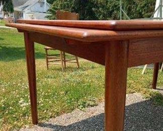 Ansager Mobler Danish Modern Teak Extension Dining Table.  Stamped with 22, AM Made in Denmark on underside of table.  