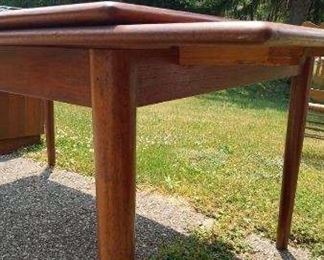 Ansager Mobler Danish Modern Teak Extension Dining Table.  Stamped with 22, AM Made in Denmark on underside of table.  