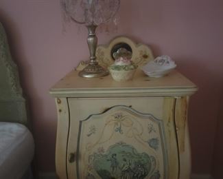 Beautiful pair of painted Bombay style night stands