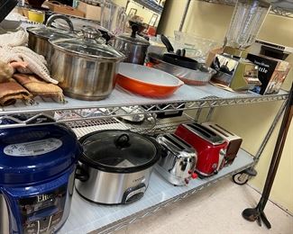 Vintage toasters and new toasters and crock pots