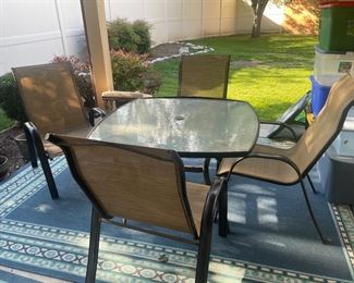 patio table and 4 comfy chairs 