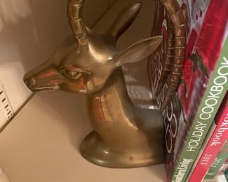close up of brass bookends -
