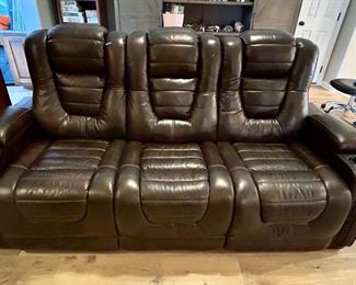 Power Leather reclining sofa - pet scratches on sides.