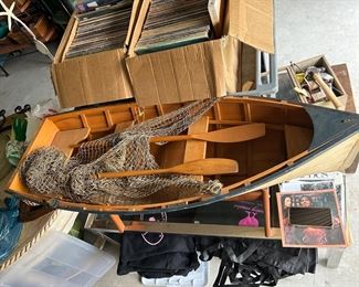 Decorative wooden boat w/ stand, netting & 2 oars