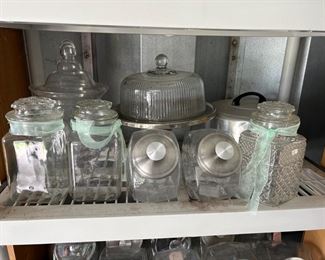 Various glass cookie jars & Pie stands