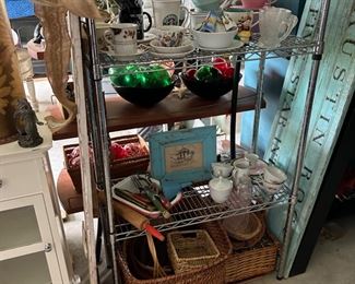 metal industrial rack:$55                                                                         Tea Cups $3 Each                                                                                        Various baskets  $1-$7                                                                             Antique Kitchen tools $25 for the group