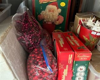 various Christmas beads $2 per bag                                                ceramic manger scene $12                                                                        Santa Singer $10             