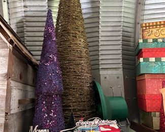 Christmas plug in Village house $ 10                                                     Metal stocking holder $5                                                                          Stackable Christmas tree set (purple) $5                                     Stackable natural Christmas Tree set (3) $25                       Christmas Tree stand $5