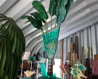 Large potted faux palm tree. 
