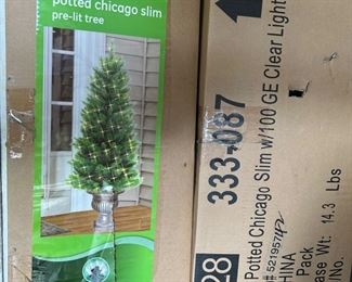 (2) 4ft potted Christmas trees $25 each