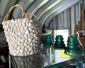 shell basket with hemp handles $15                                                      Antique glass insulators $5