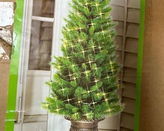 4ft potted prelit potted tree - 2 available