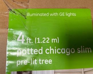 4ft potted prelit potted tree - 2 available