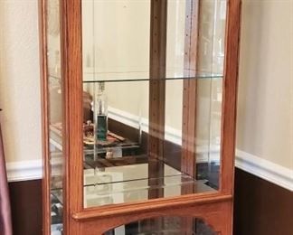 2 of 2 glass lighted display cabinets.