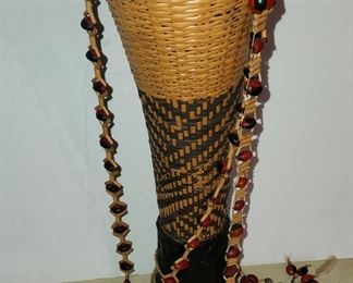 basket with darts,  2 necklaces 