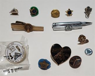 Employee gift The pel pins from pack bell and AT&T.