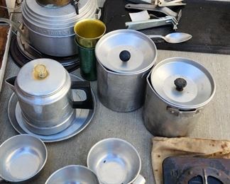 Vintage Camp ware coffee pots cups gas burners plates and pots. Aluminum griddle pants.
