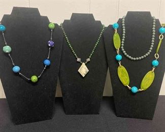 Four Green Colored Necklaces