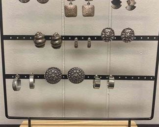 Nine Silver Toned Earrings