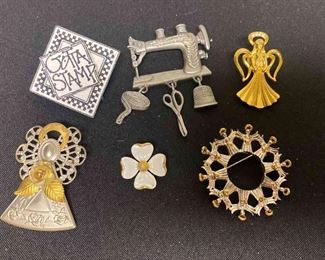 Six Brooches