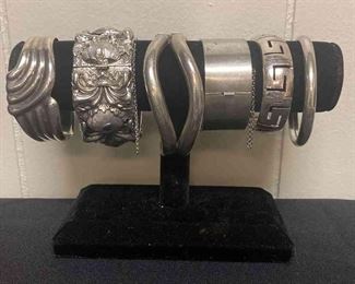 Six Silver Colored Bracelets