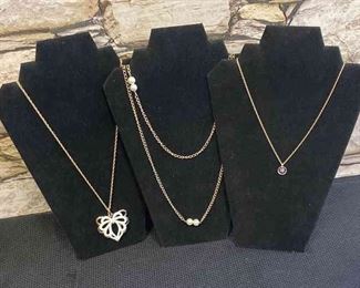 Three Gold Colored Chained Necklace With A Little Splash Of Fun