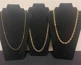 Three Gold Colored Chains