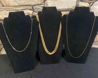 Three Gold Colored Necklaces
