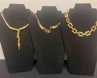 Three Statement Gold Colored Necklaces