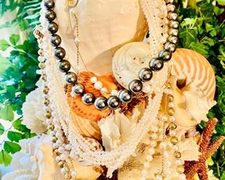 Tahitian graduated black pearls with 18k and diamond clasp and other strands of pearls