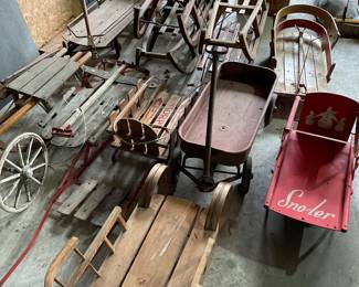 Tons of great vintage sleds and wagons!